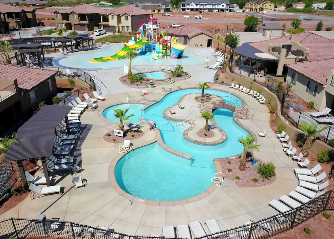Aerial view of the Kids' Cove water park, lazy river and lounge chairs