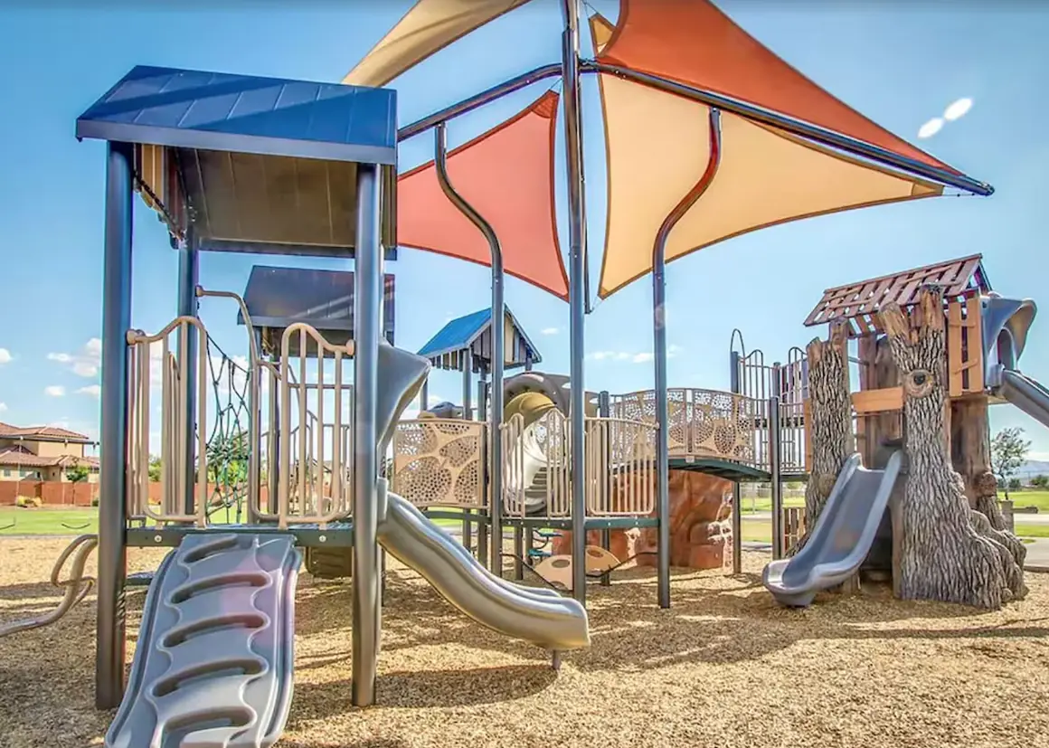Playground with slides under shade sails